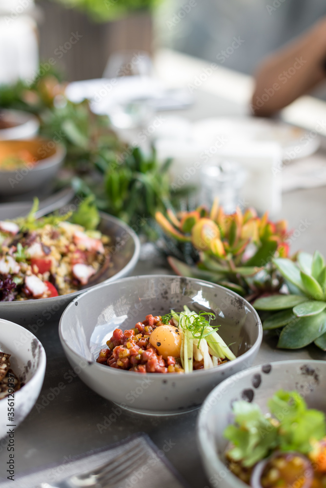 Asian Style Beef Tartare with Egg Yolk and Crunchy Vegetables Asian Style Beef Tartare with Egg Yolk and Crunchy Vegetables