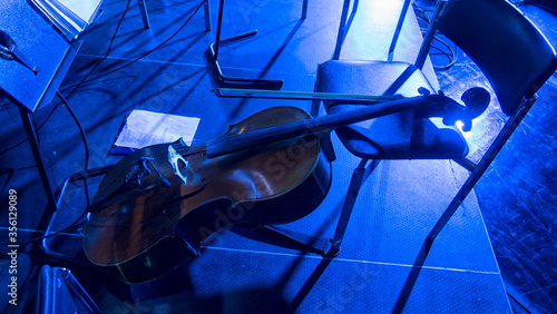 violin on stage before a symphonic classical concert