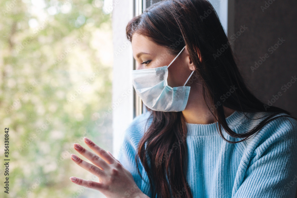 Woman in isolation at home for virus outbreak Woman in isolation at home for virus outbreak