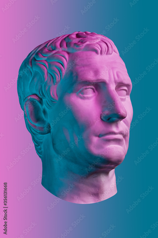 Statue of Guy Julius Caesar Octavian Augustus. Creative concept colorful neon image with ancient roman sculpture Guy Julius Caesar Octavian Augustus head. Cyberpunk, vaporwave and surreal art style. Statue of Guy Julius Caesar Octavian Augustus. Creative concept colorful neon image with ancient roman sculpture Guy Julius Caesar Octavian Augustus head. Cyberpunk, vaporwave and surreal art style.
