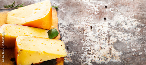 top view on cheese lying on rustic background