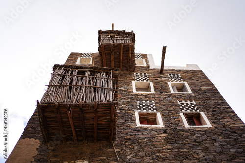 Obraz na płótnie Low angle of beautiful historical houses in Rijal Almaa heritage village w salonie