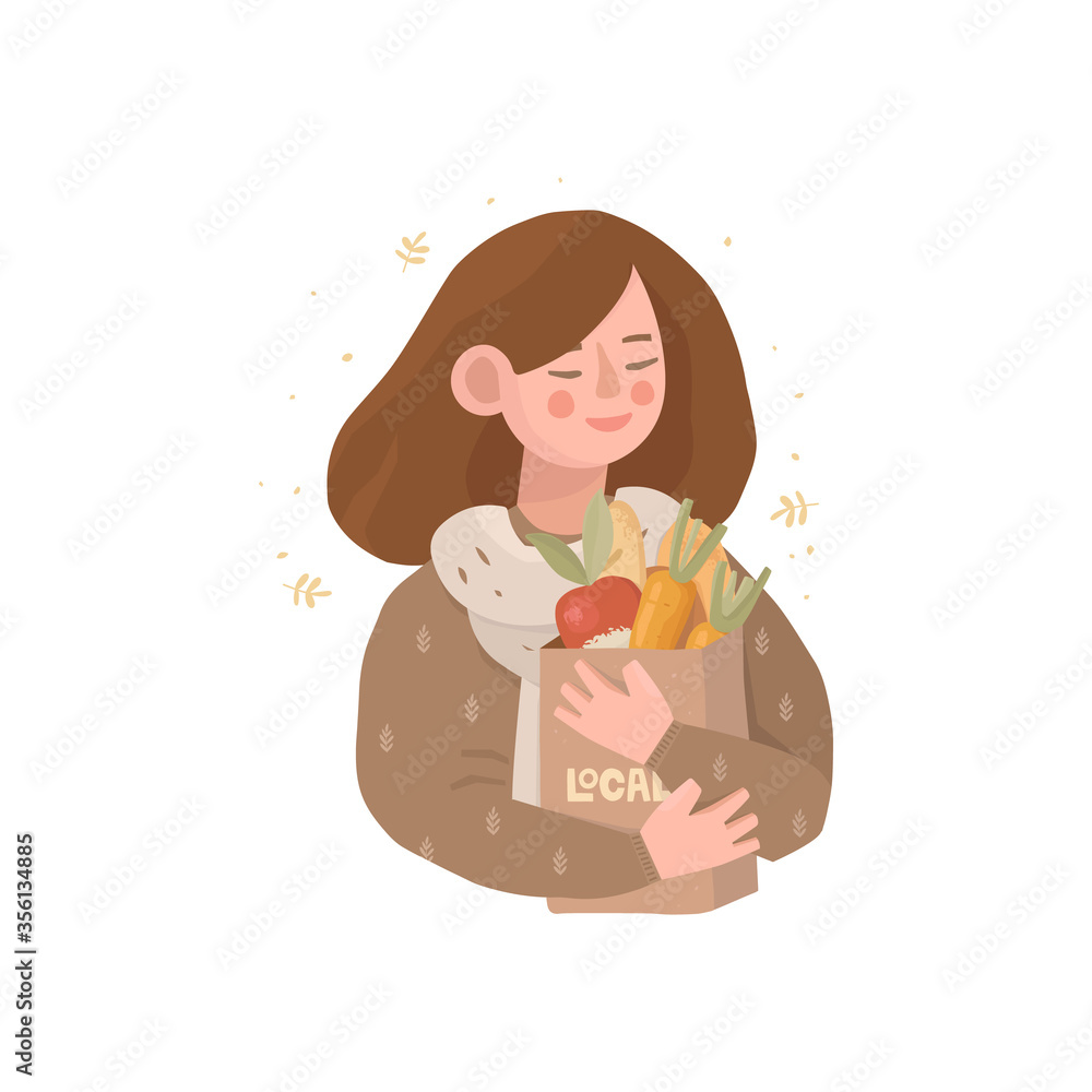 Cute girl with a craft paper bag in her hands. On the package inscription Cute girl with a craft paper bag in her hands. On the package inscription