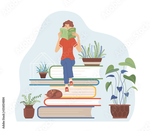 Woman sitting on books pile and reading a book about gardening