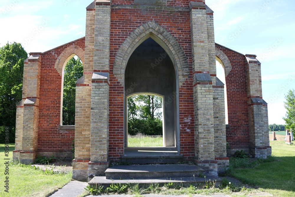Doorway and windows of old Catholic church built in 1883 and closed 1952 left as tribute Doorway and windows of old Catholic church built in 1883 and closed 1952 left as tribute