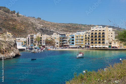 Beautiful Aerial View over Xlendi Town  Xlendi Bay  Gozo Island  Malta  Travel Wallpaper 