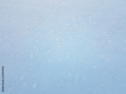 tennis ball markings on blue tennis court surface