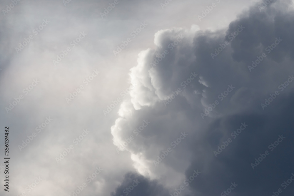 white and black cloud background texture on grey sky. white and black cloud background texture on grey sky.