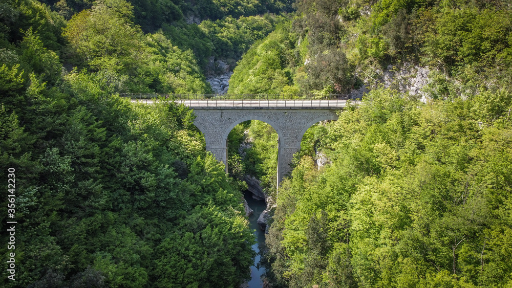 Lavelle bridge between Cerreto Sannita and Cusano Mutri in Benevento, Italy.  This place is famous in Italy due to the erosion of the rocks by the river. Perfect place for trekking and nature lovers.