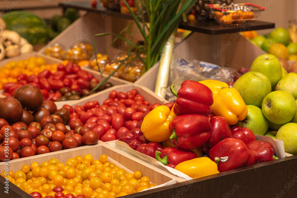 A counter with juicy and delicious vegetables and fruits. With lots of wholesome food. A counter with juicy and delicious vegetables and fruits. With lots of wholesome food.