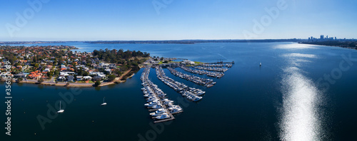 Aerial view of Applecross, Yacht club and the mouth of the Canning River in the Swan River. On the horizon are the districts of Dalkeith, Nedlands, Crawley, Kings Park, Perth CBD and South Perth. 