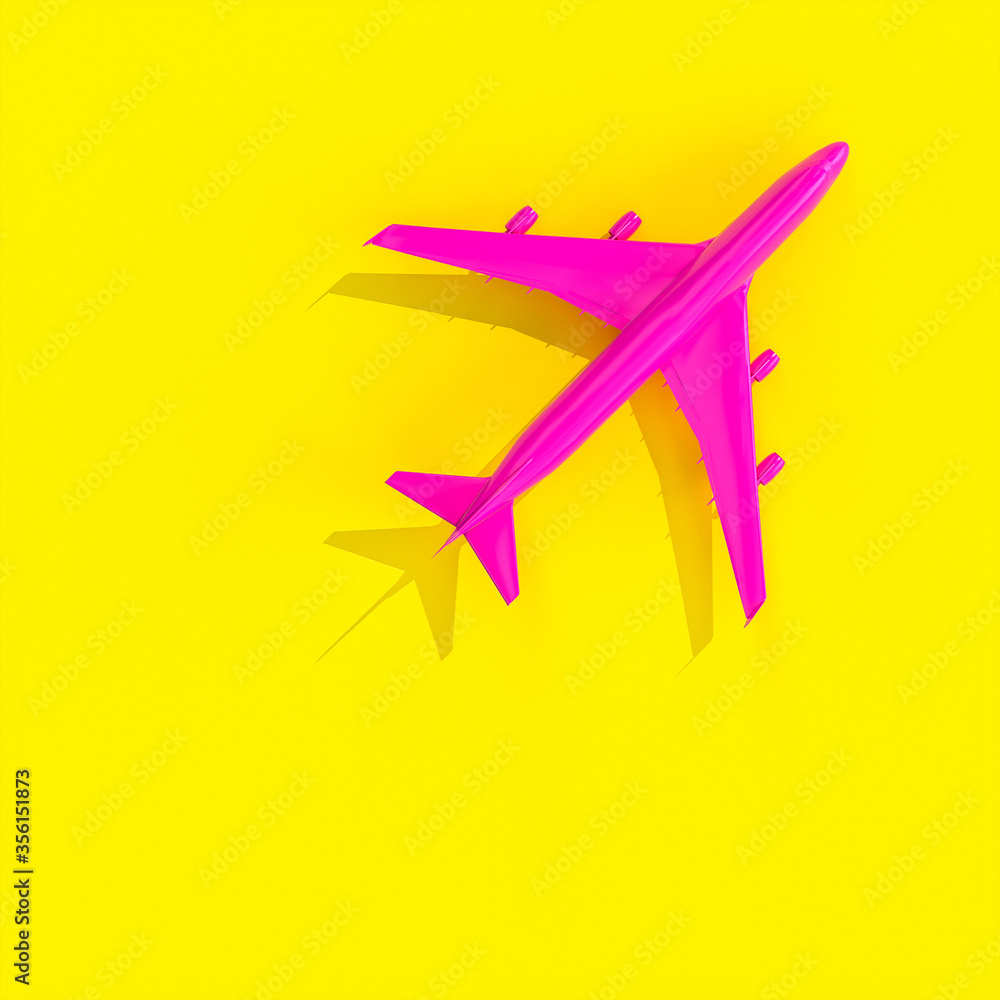 fuchsia plane on a yellow background in flat lay style. fuchsia plane on a yellow background in flat lay style.