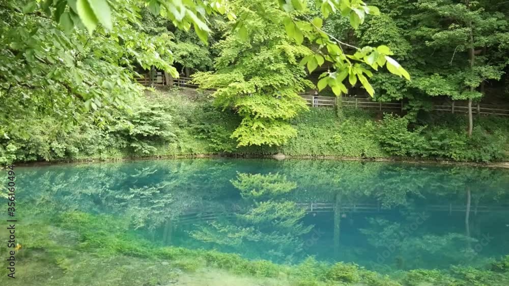View on the Blautopf Lake in Blaubeuren, Swabian Alb, Germany View on the Blautopf Lake in Blaubeuren, Swabian Alb, Germany