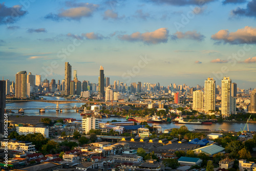 cityscape of bangkok with double bridge and chao praya river in clear sky