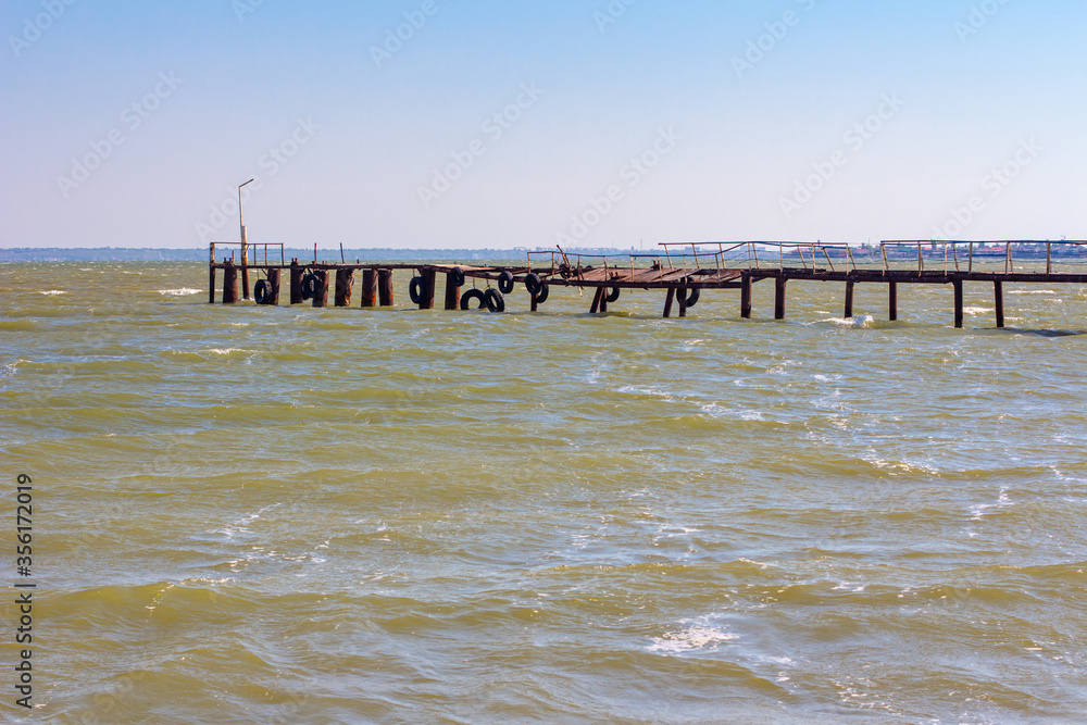 broken old pier for small boats broken old pier for small boats