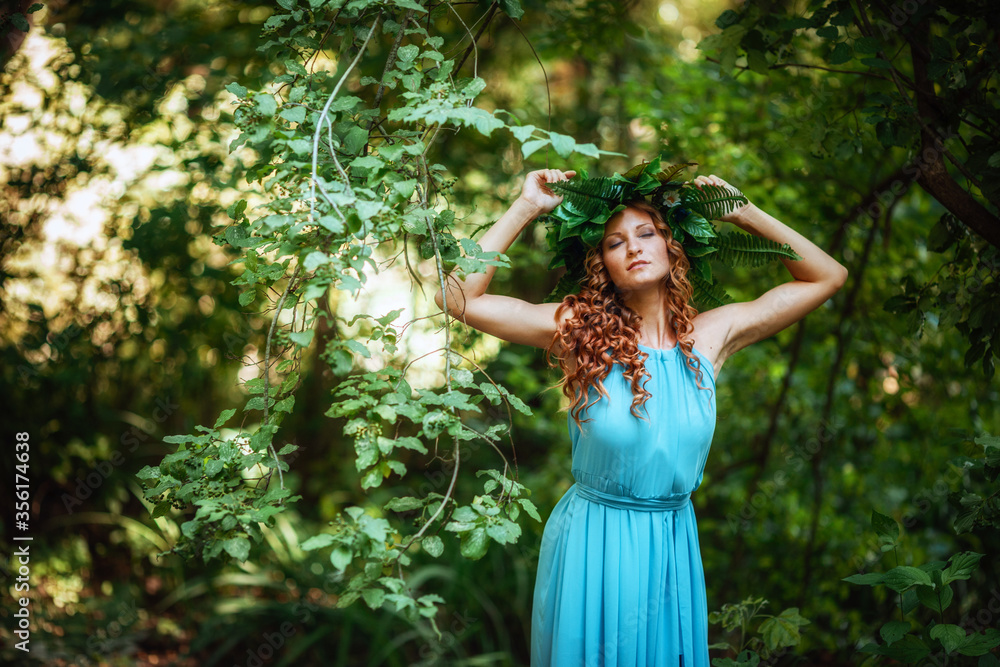 a beautiful young woman celebrates in the woods the solstice day a beautiful young woman celebrates in the woods the solstice day