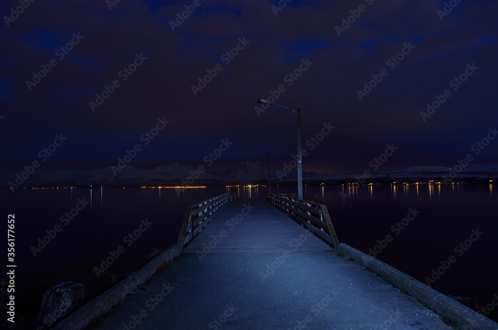 long pier at night