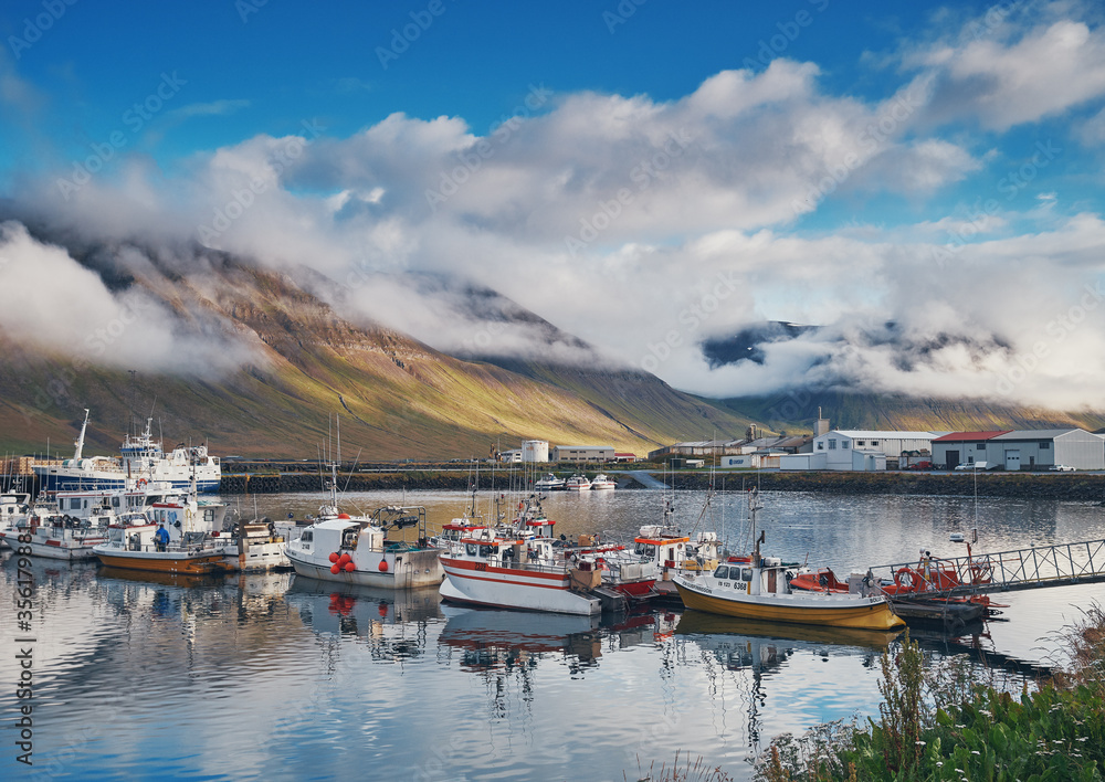 Bolungarvik, Iceland / Iceland - september 2018: Fishing boats in the harbor of Bolungarvik, Iceland.