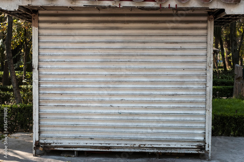 Billede på lærred Closed white traditional newspaper kiosk in a Mexico City park