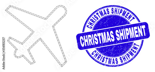 Web mesh airplane icon and Christmas Shipment watermark. Blue vector rounded scratched watermark with Christmas Shipment phrase. Abstract carcass mesh polygonal model created from airplane icon.