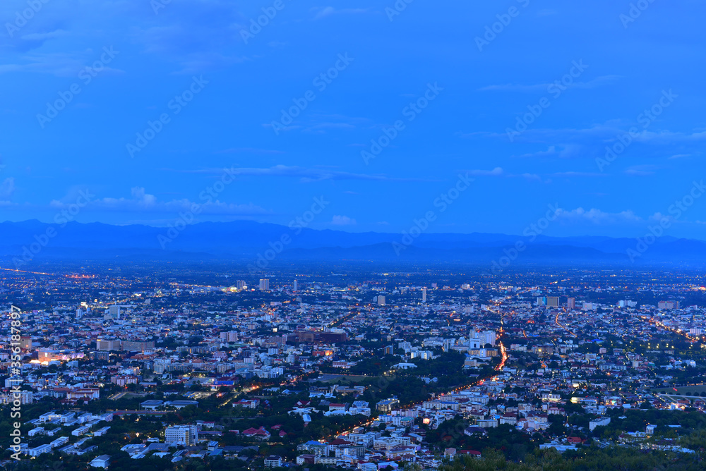 Photograph of Chiang Mai city in evening time with twilight and blue sky