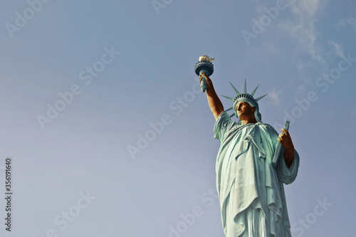 The statue of Libery in New York represented as afro american. Concept for integration, tolerance and brotherhood and concept against racism, inolterance and discrimination
