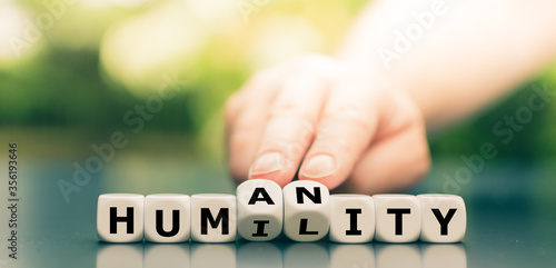 Dice form the words "humility" and "humanity".