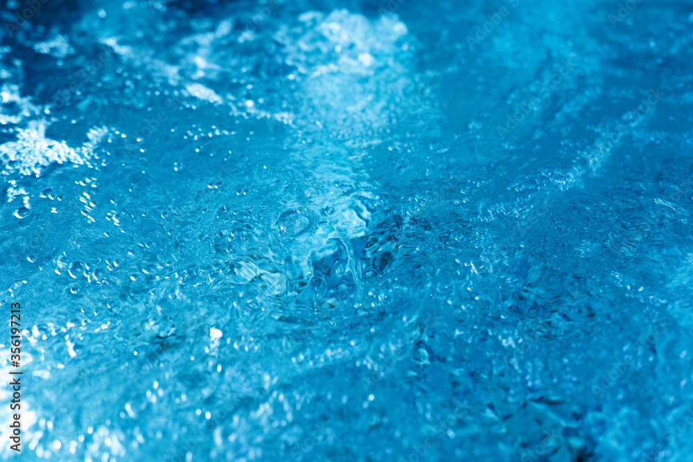 Soft focus of bubbling water background, Relaxation pool, spa hydrotherapy
Soft focus of bubbling water background, Relaxation pool, spa hydrotherapy