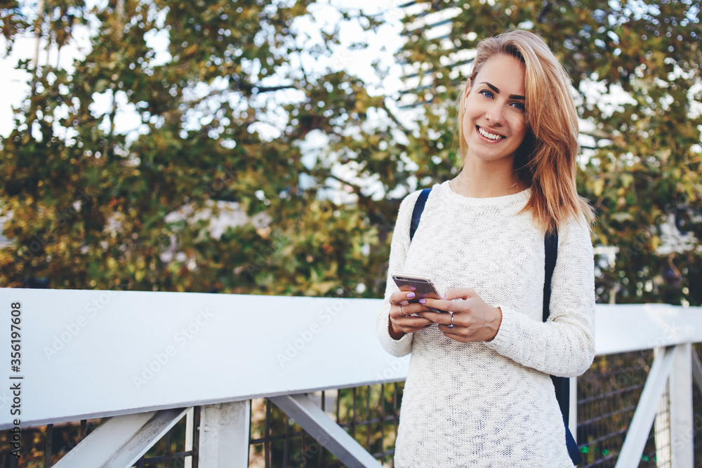 Naklejka premium Smiling female lawyer is talking on mobile phone about her winning trial