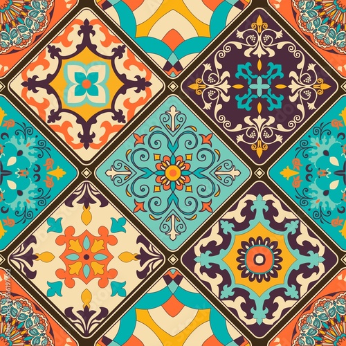 Seamless colorful patchwork tile with Islam, Arabic, Indian, ottoman motifs. Majolica pottery tile. Portuguese and Spain decor. Ceramic tile in talavera style. Vector illustration