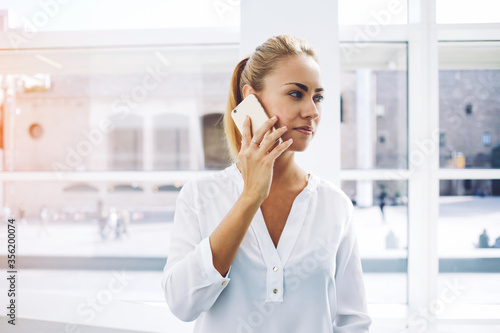 Woman successful lawyer talking on mobile phone after work on digital tablet Free Download Woman successful lawyer talking on mobile phone after work on digital tablet - GFXLoad