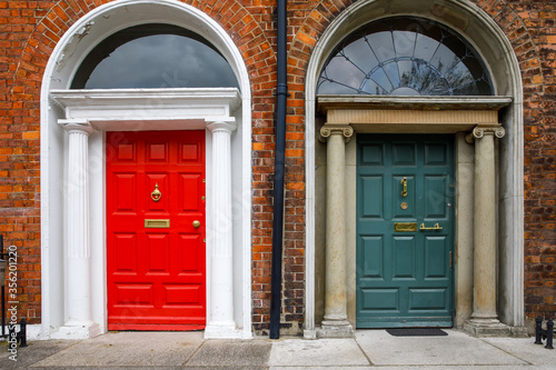 Colorful georgian doors in Dublin, Ireland. Historic doors in different colors painted as protest against English King George legal reign over the city of Dublin in Ireland