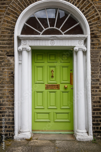 Colorful georgian doors in Dublin, Ireland. Historic doors in different colors painted as protest against English King George legal reign over the city of Dublin in Ireland