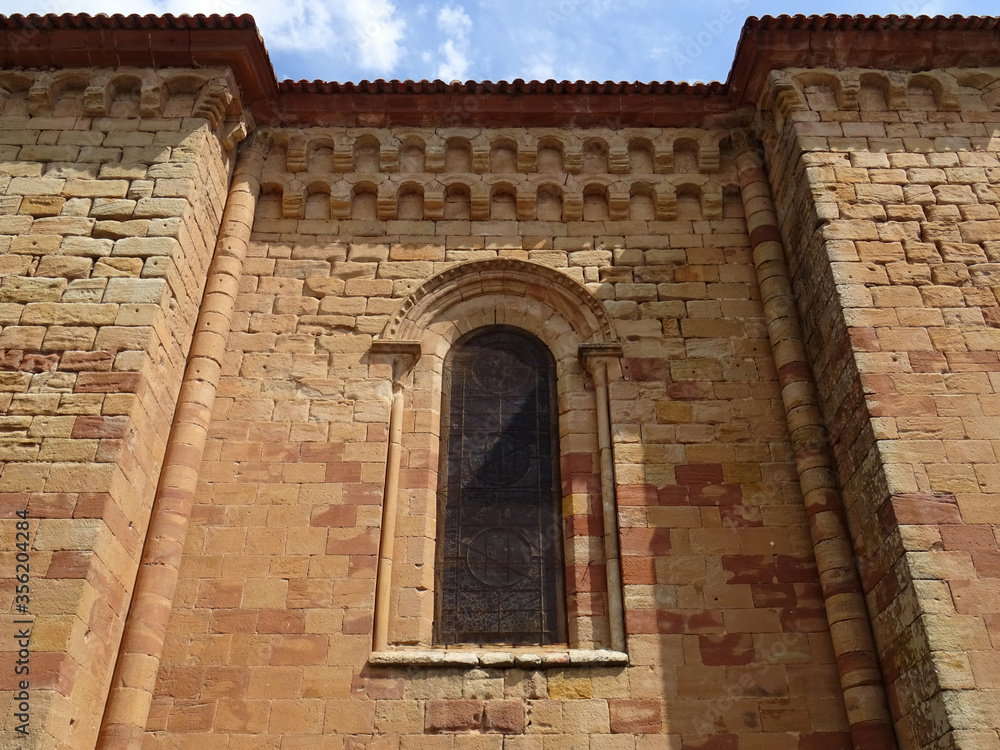 Cathedral od Sigüenza. Guadalajara. Spain.
Detail of Romanesque window and wall of red and yellow sandstone ashlars. 12 and 13 Century. Cathedral od Sigüenza. Guadalajara. Spain.
Detail of Romanesque window and wall of red and yellow sandstone ashlars. 12 and 13 Century.