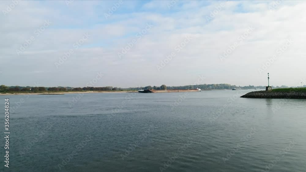 WS POV Barges on river during drought / Empel, Noord-Brabant, Netherlands WS POV Barges on river during drought / Empel, Noord-Brabant, Netherlands