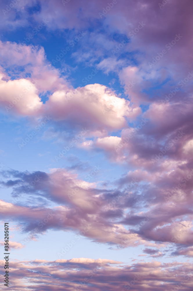 Natural sky composition. Sunny vast blue sky abstract background. Beautiful cloudscape, view over white fluffy clouds. Freedom concept, on the heaven. Element of design.