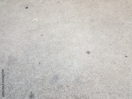 grey asphalt or ground or surface with stains