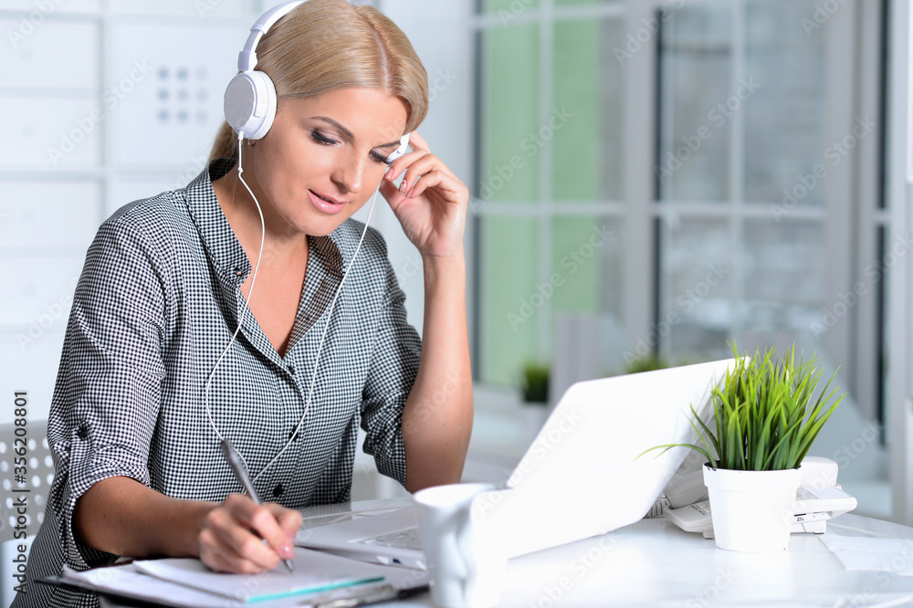 Portrait of a businesswoman working in office Portrait of a businesswoman working in office