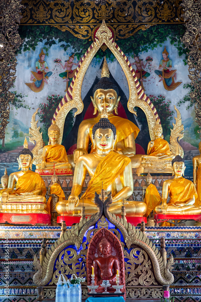 the beautiful golden Buddha statue in the temple of Wat Chang Kong, Chiangmai, Thailand
