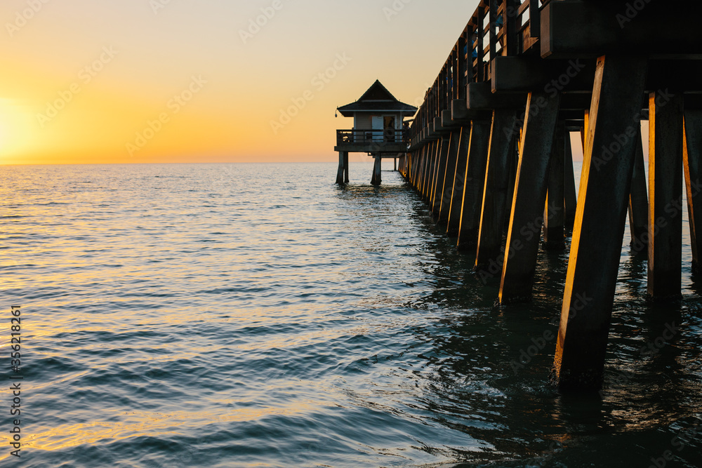 Naples Pier at sunset in Florida, United States of America Naples Pier at sunset in Florida, United States of America
