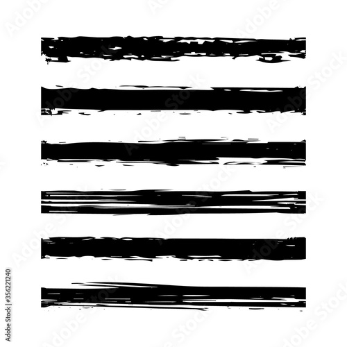 Set paint brush strokes. Border brush. Grunge long thin smudges texture. Scribbles ink paint. Painted stripes. Black scribble stroke isolated on white background. Freehand paintbrush gouache textures