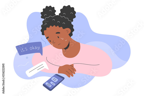 Teenage girl crying and text messaging with psychologist in smartphone app talking about a problem, online psychotherapy concept, text therapy for teenagers, counseling by online chat