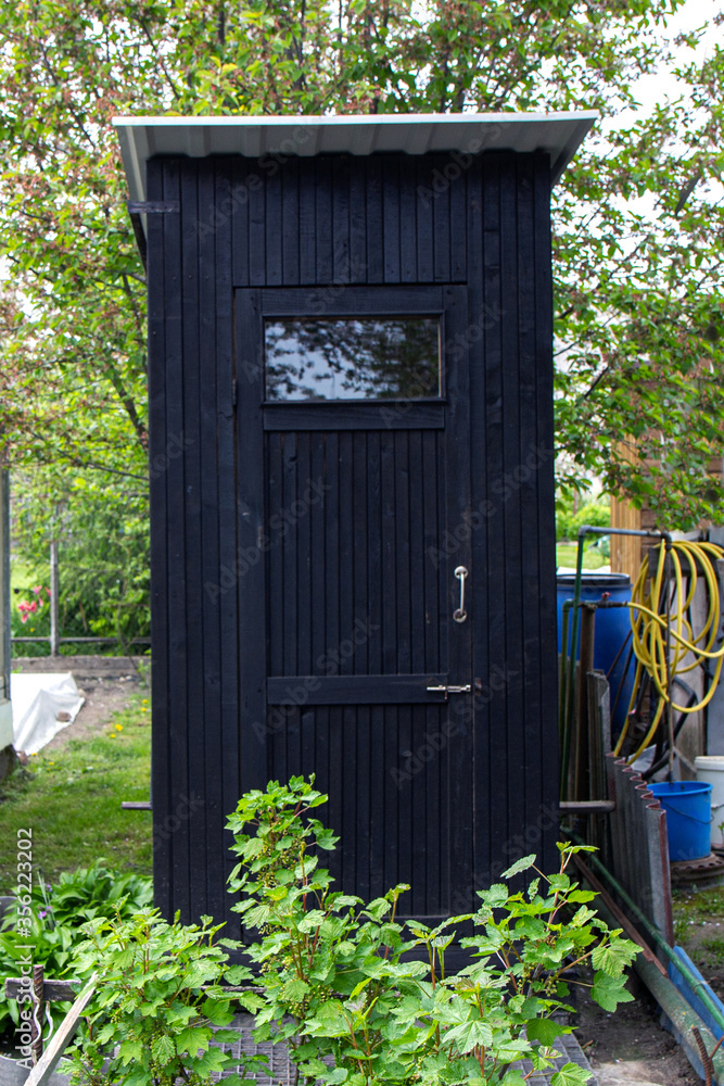 Black village wooden rustic outdoor toilet outside Black village wooden rustic outdoor toilet outside