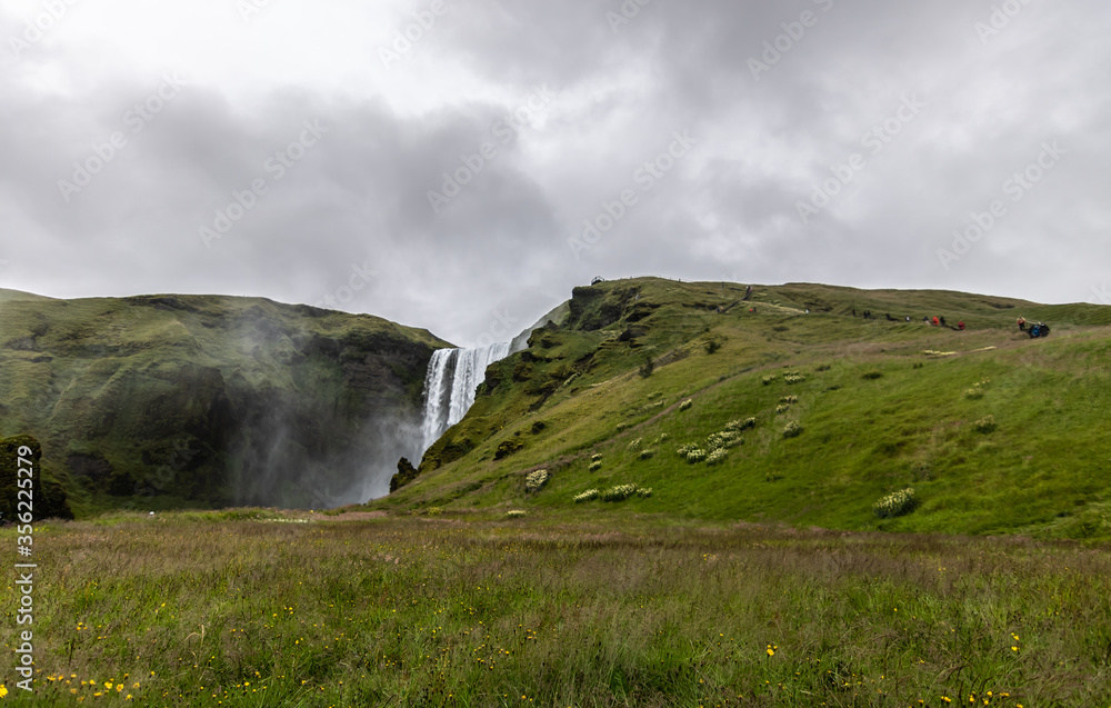 Icelandic Waterfall with Mountains