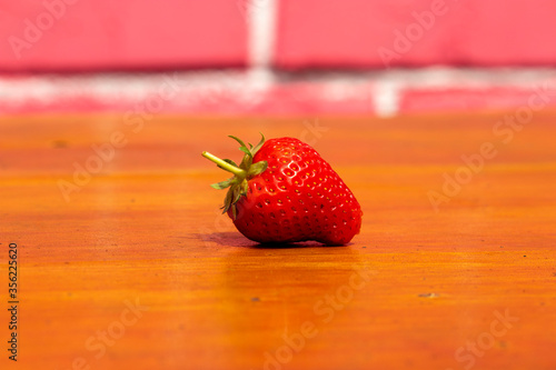 strawberry in a wooden