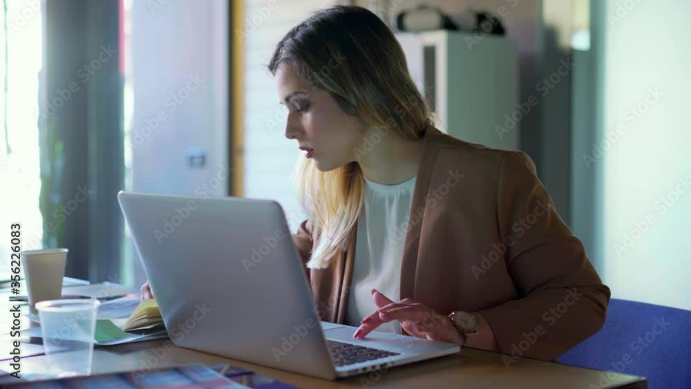 CU Young businesswoman working in office / Milan, Italy CU Young businesswoman working in office / Milan, Italy