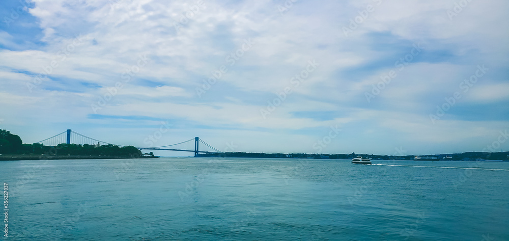 New York City. View on the Verrazano Narrows Bridge is a double-decked suspension bridge that connects the New York City boroughs of Staten Island and Brooklyn.