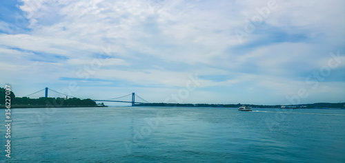 New York City. View on the Verrazano Narrows Bridge is a double-decked suspension bridge that connects the New York City boroughs of Staten Island and Brooklyn.