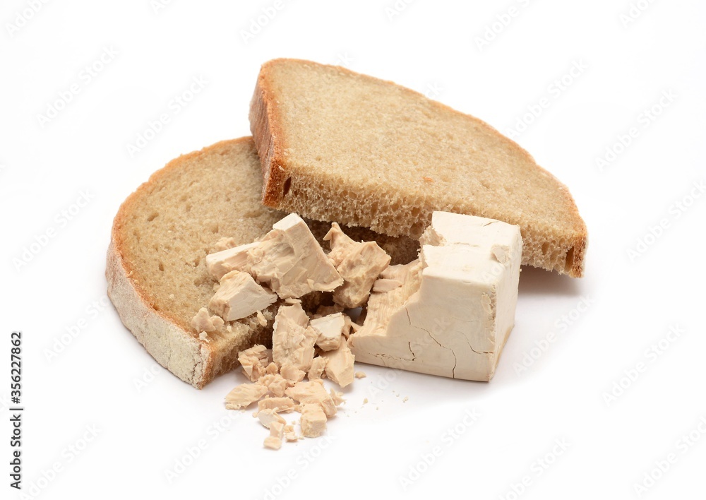 Crumbled fresh yeast block with bread.
