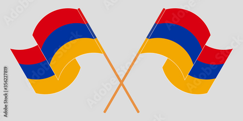 Crossed and waving flags of Armenia.